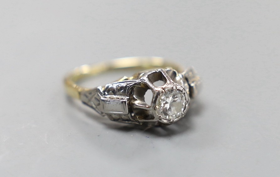 An 18ct, plat and solitaire diamond ring, size M/N, gross weight 3.8 grams
